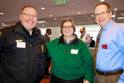 Employees enjoy a service anniversary recognition reception.